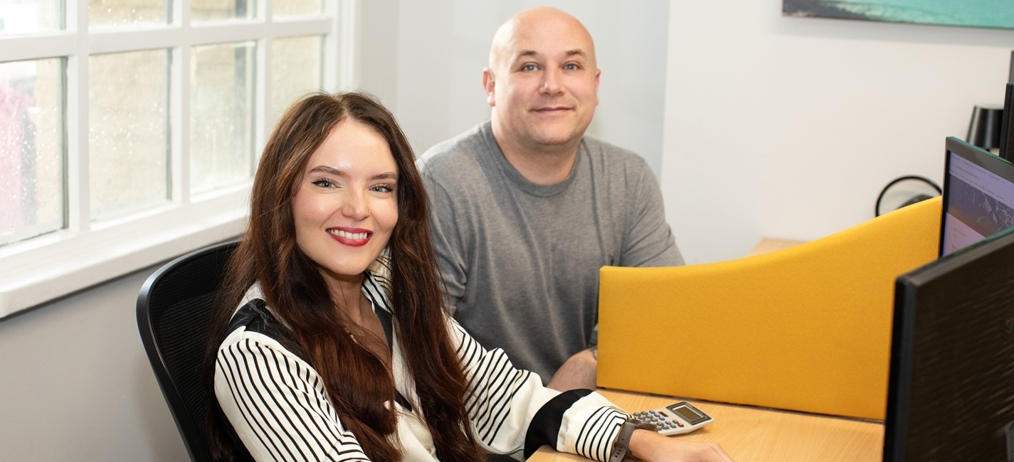 Emily and Matt Working eShores Office